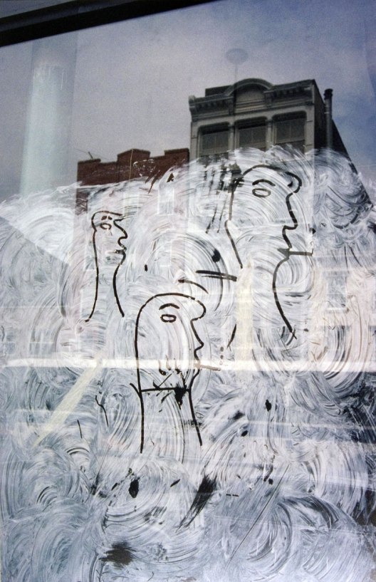 Saul Leiter  Graffiti Heads 1950
